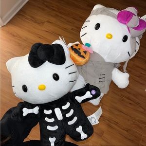 Hello Kitty Halloween Skeleton + Mummy Side Stepper Door Music Greeters (2)
